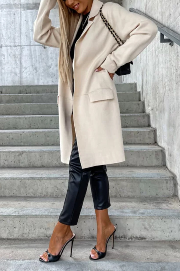 Trench coat with large lapel pockets