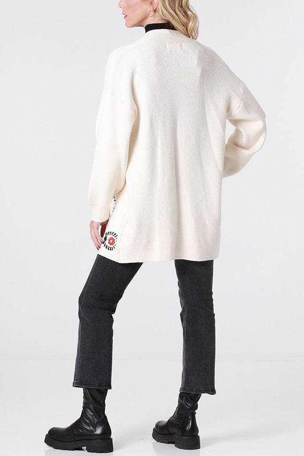 Off-white knitted cardigan with embroidery detail