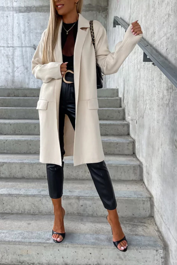 Trench coat with large lapel pockets