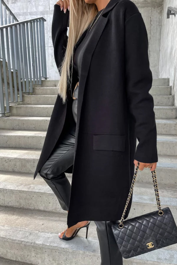 Trench coat with large lapel pockets